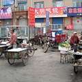 北京不僅有單車專用道，有些地方還有專人看管自行車。圖片來源：吳懿婷
