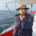 陳惠芳，黑潮基金會的志工，也是今天賞鯨船的解說員。
